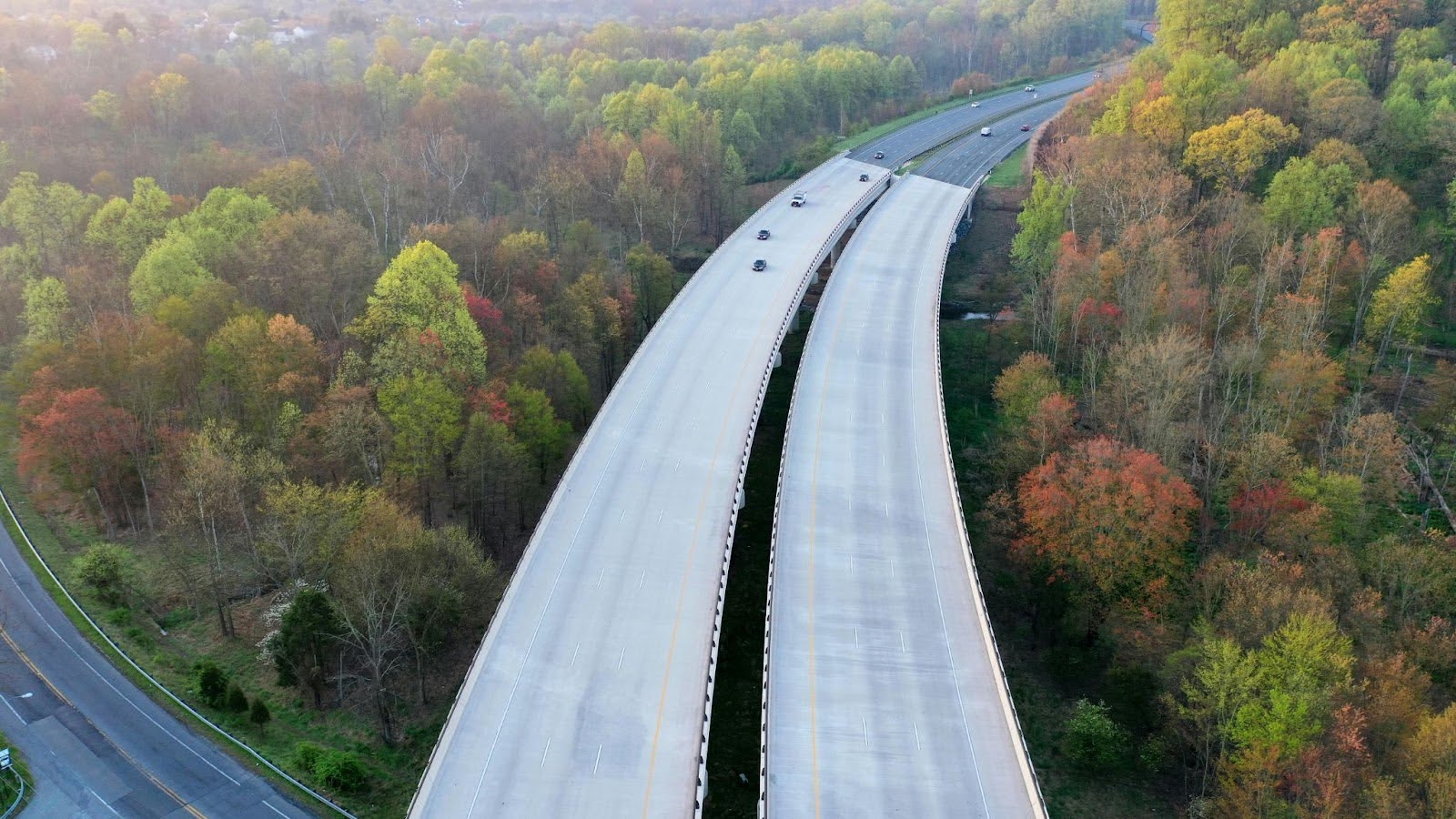 Arial image of two highways between trees