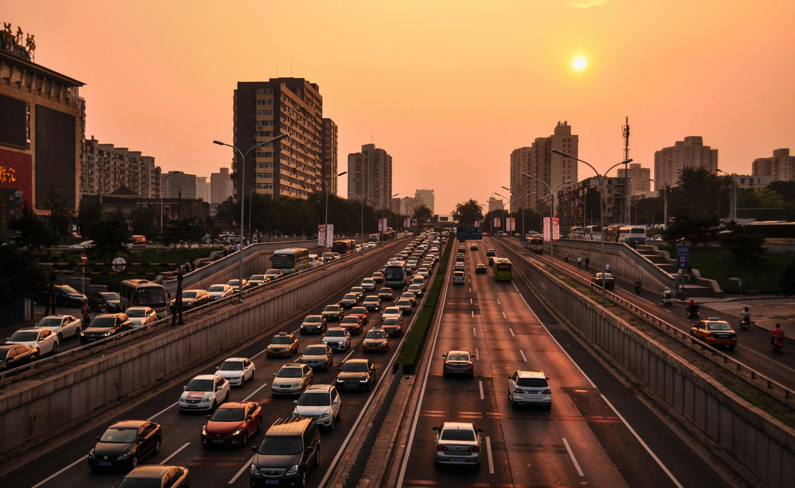 Cars along a congested urban highway.