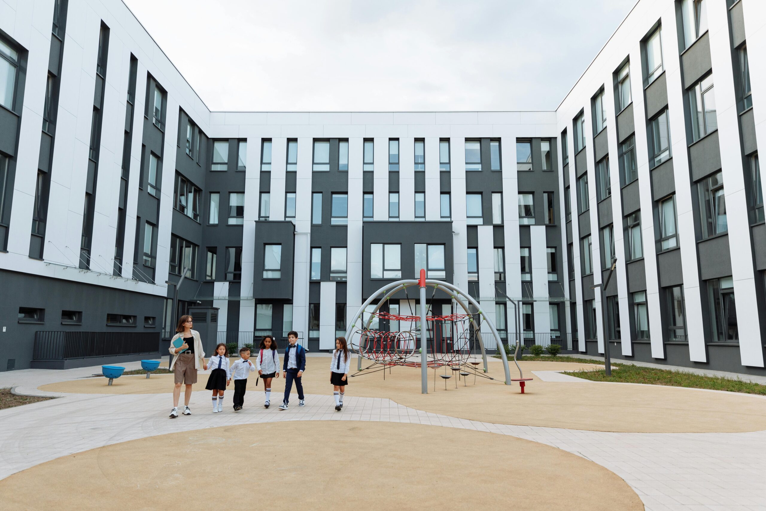 A school courtyard with middle schoolers.