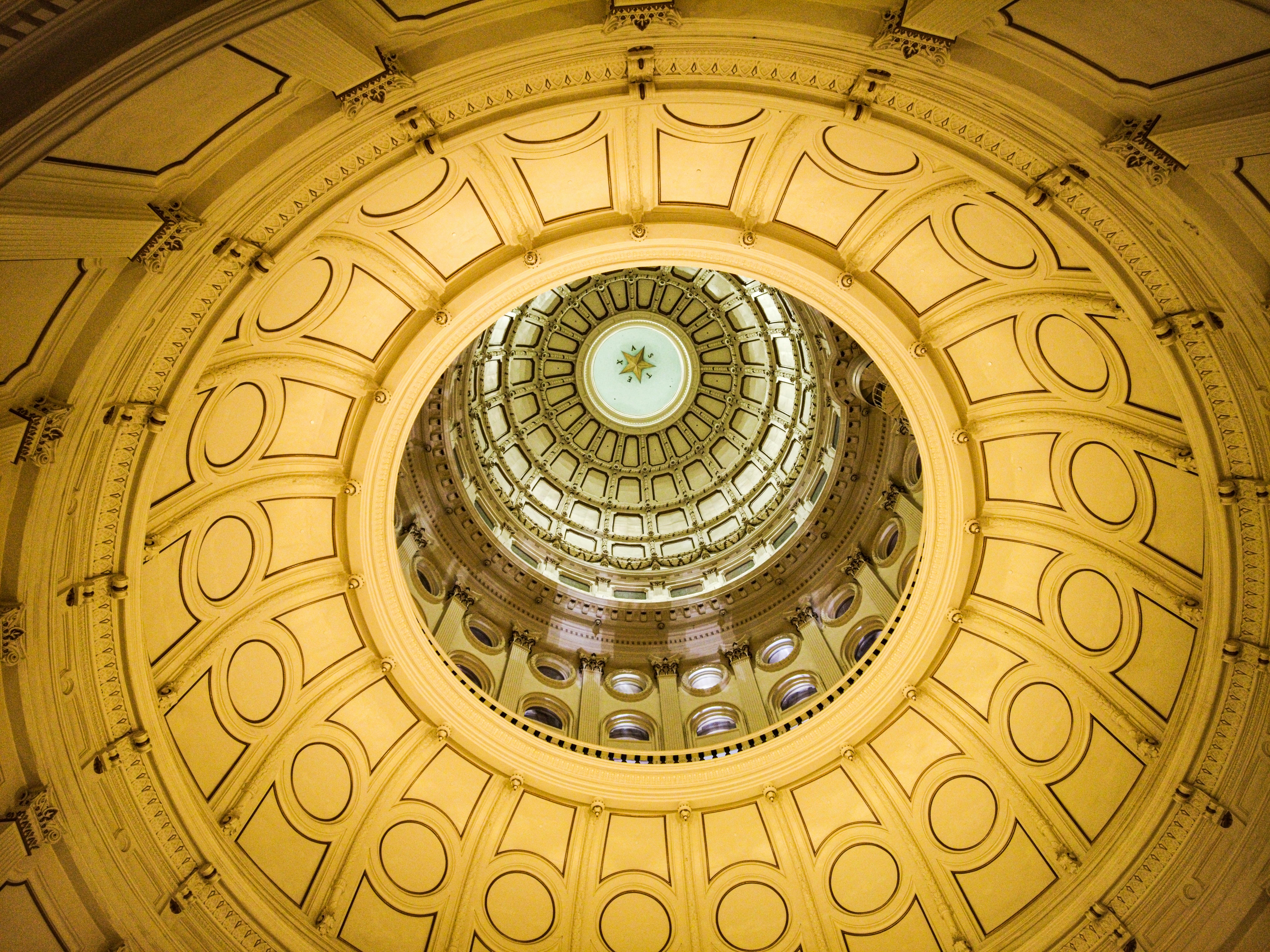 The seal on the top of the Texas Capitol Building's ceiling.