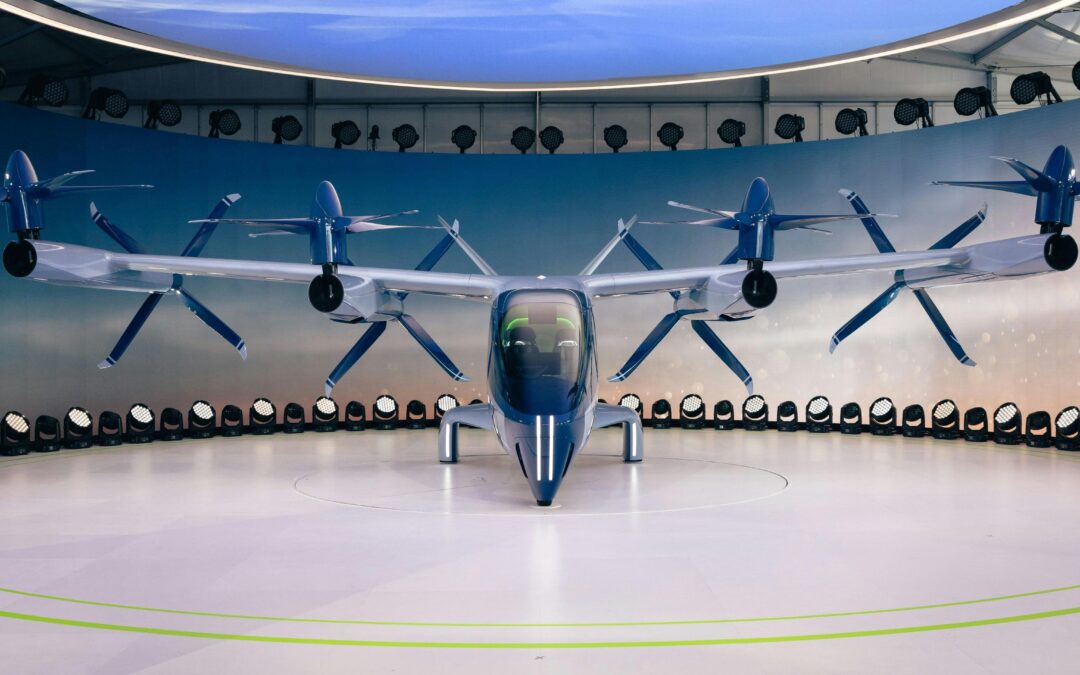 An advanced air mobility vehicle or evtol on display from the front.