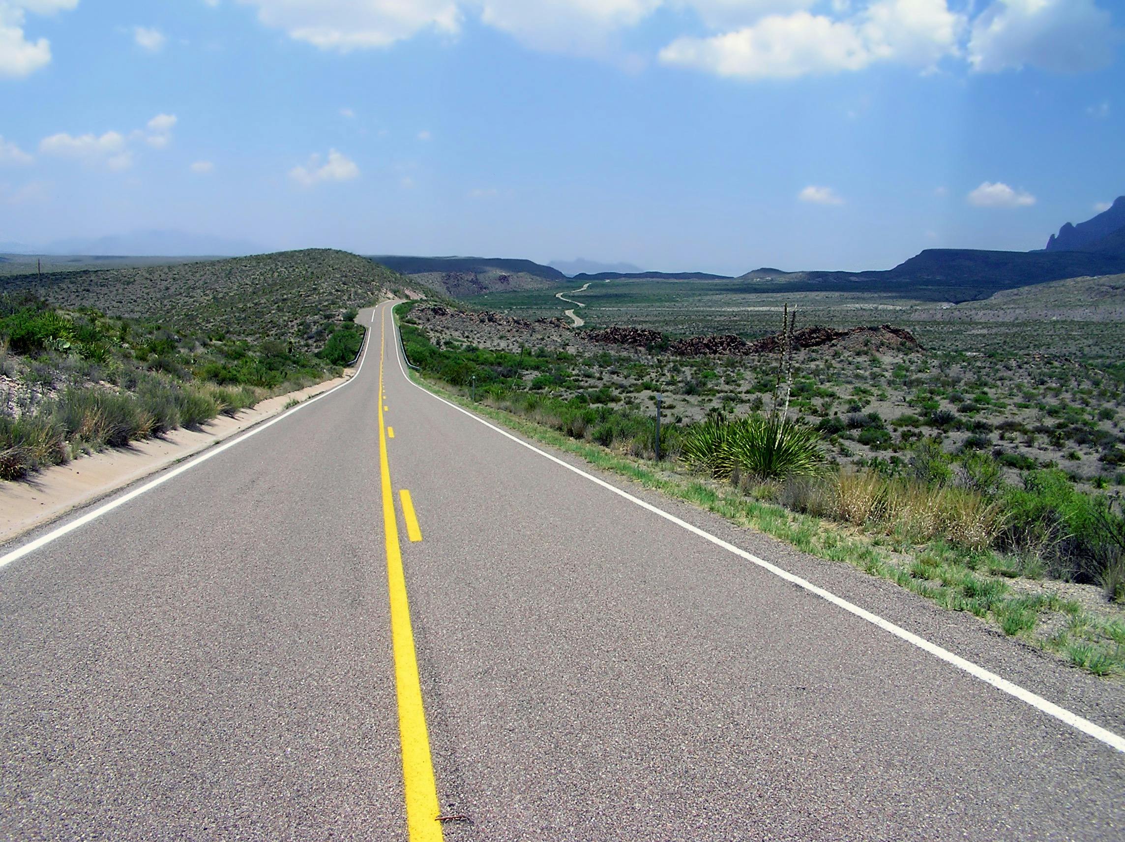 A Texas highway leading to an endless road.