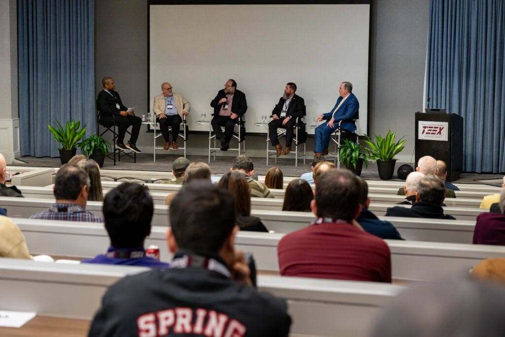 A panel of speakers at the 2026 Cyber Readiness Summit in College Station, Texas.