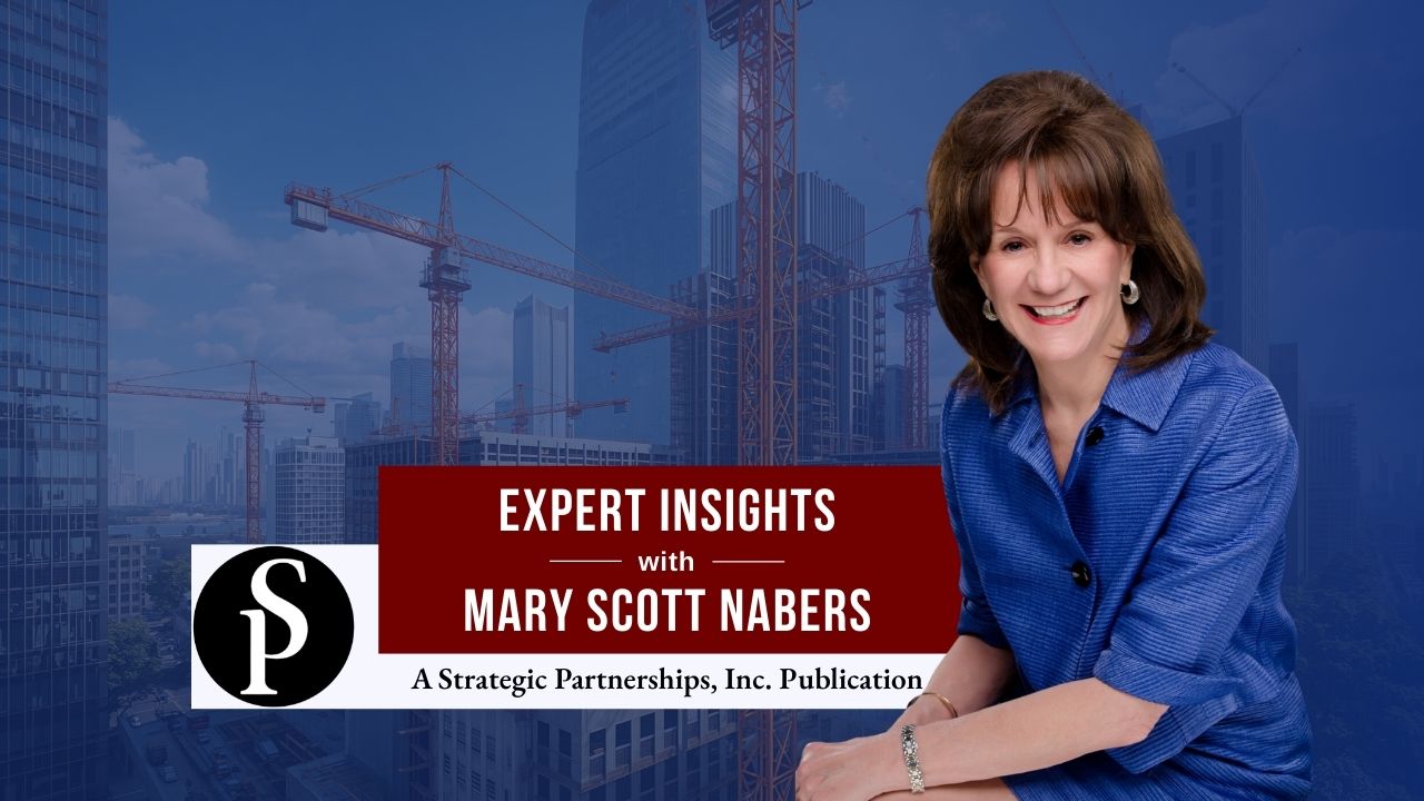 MSN Column (720 x 480 px) March 13 Mary Scott Nabers before construction vehicles and cranes for her weekly column.