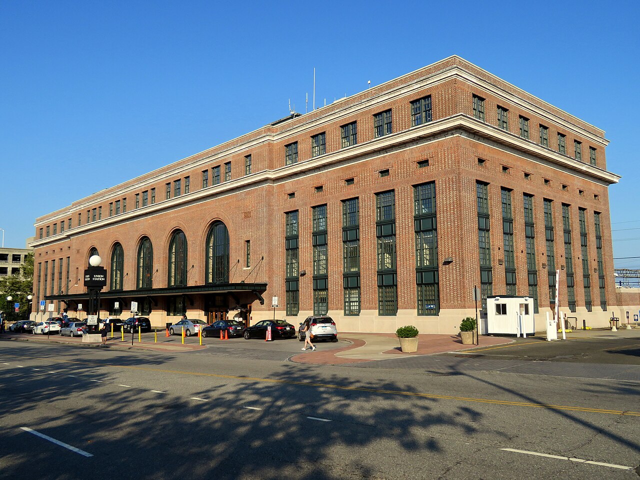 1280px-New_Haven_Union_Station,_September_2018 The Union Station building exterior on a sunny day in New Haven, Connecticut.