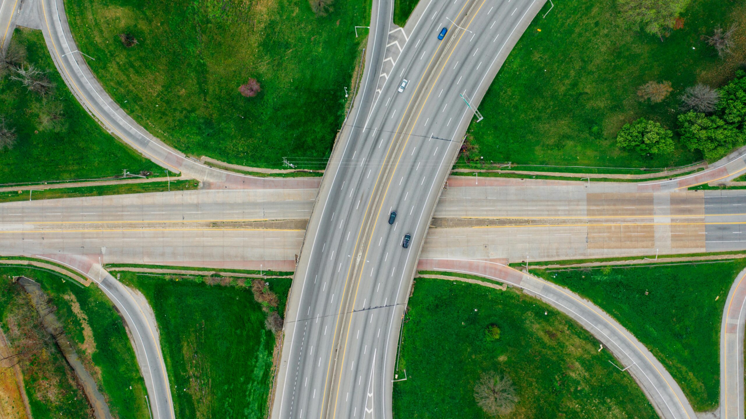 texas-transportation-needs An aerial view of a highway with cars above another highway.