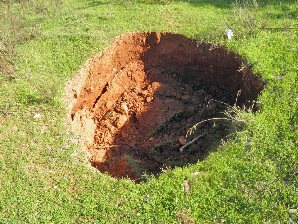 sinkhole Aging waste and sewer systems causing sinkhole effect