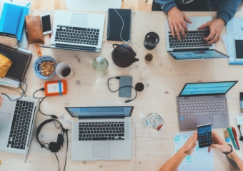unsplash office computers  340x240 As technology spending surges, government changes will be noticeable